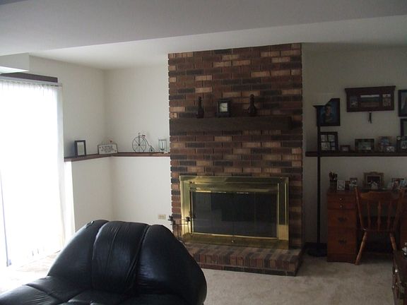 family room with brick fireplace