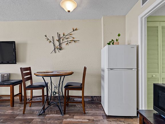 Refrigerator and dining table