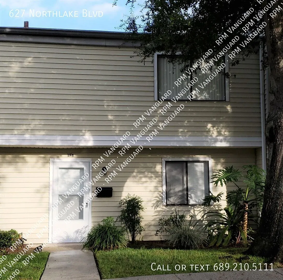 2-Story Townhouse with New Fridge and Microwave, Private Fenced-In Patio and Water Included — Photo 1