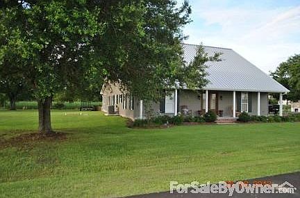 Front & side yard
						:
						Large side yard with 2 mature oaks