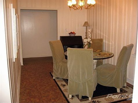 Dining room has tile floors.