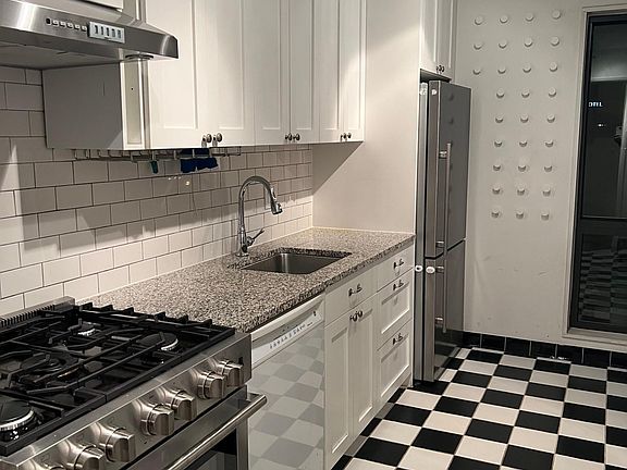 kitchen, with Blomberg stove and refrigerator