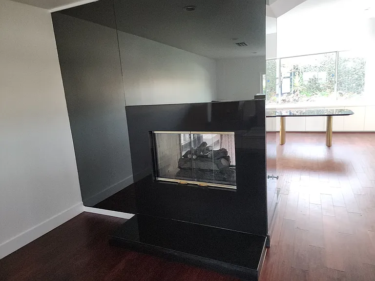 fireplace between living room and bonus room