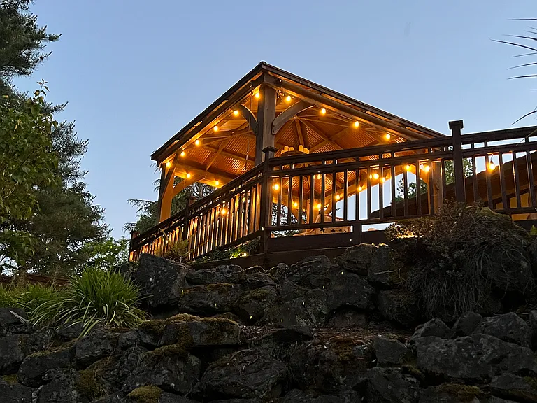 View from the sea wall to the covered outdoor living room.