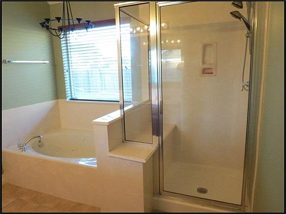 Another look at the master bath showing the garden tub and separate shower.