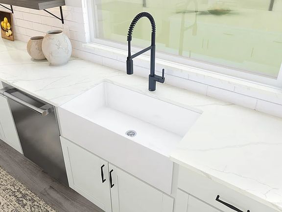 Kitchen with apron-front sink