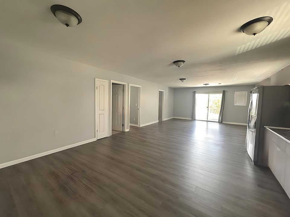 UPSTAIRS -LIVING/KITCHEN AREA W 3 BEDS 2 BATH TO THE LEFT DOORS