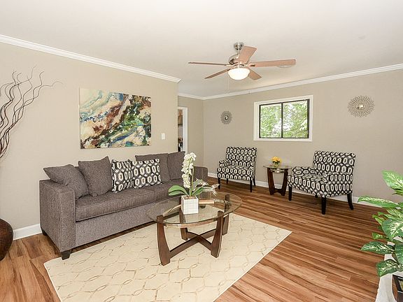 Den with Oversized Fireplace