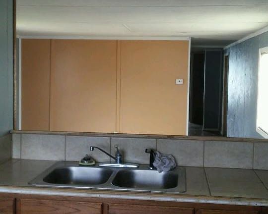 Kitchen overlooking living room so you stay conneted