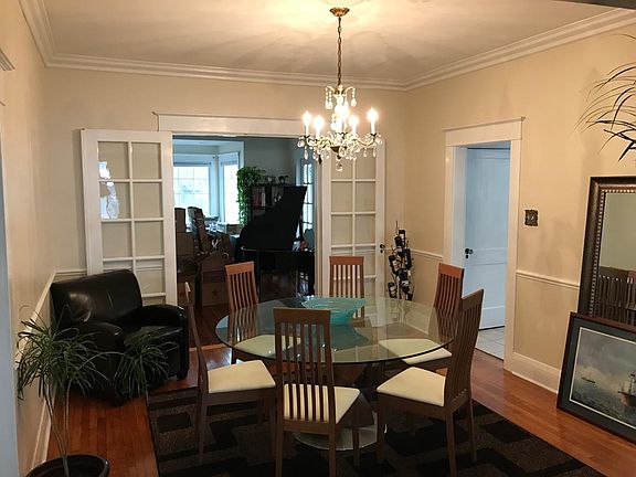 Dining Room, original brass crystal chandelier, looking into