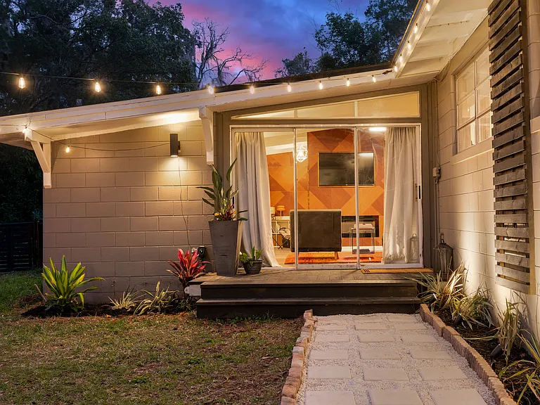 Exterior - patio doors leading to back yard and path to hot tub