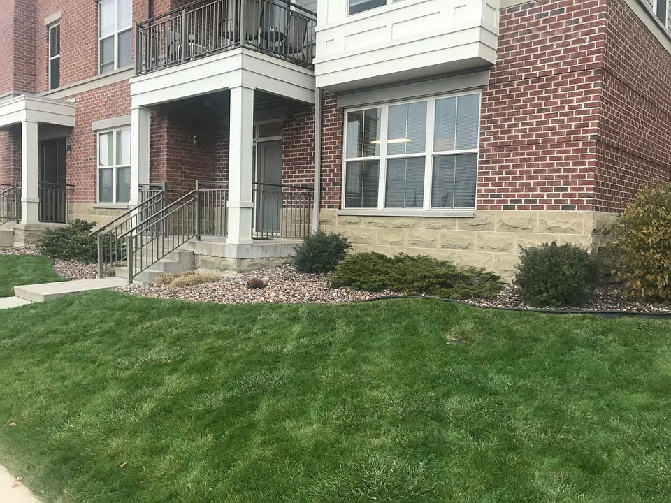 View of patio with entrance to unit