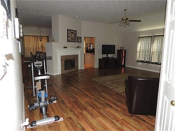 Spacious family room. Check out the laminate wood floors!