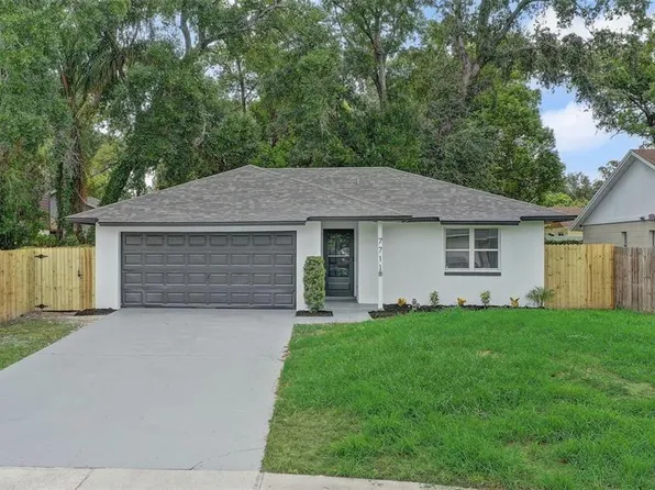 7711 LAKESIDE WOODS DRIVE, ORLANDO, FL 32810