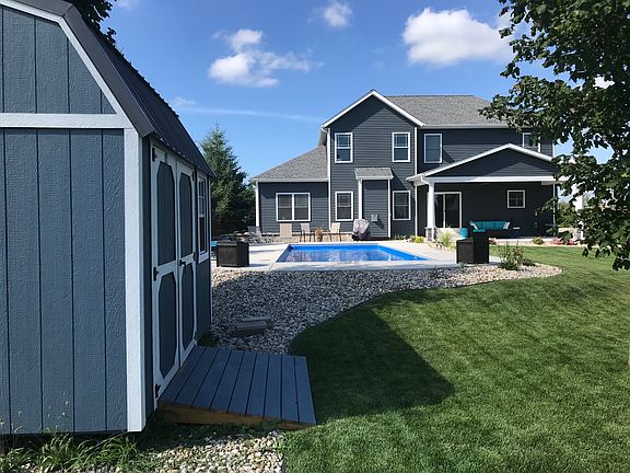 Large backyard with storage 
