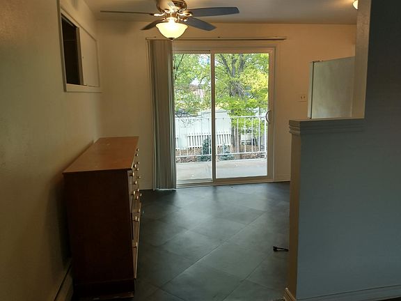 Bright kitchen with glass doors to deck