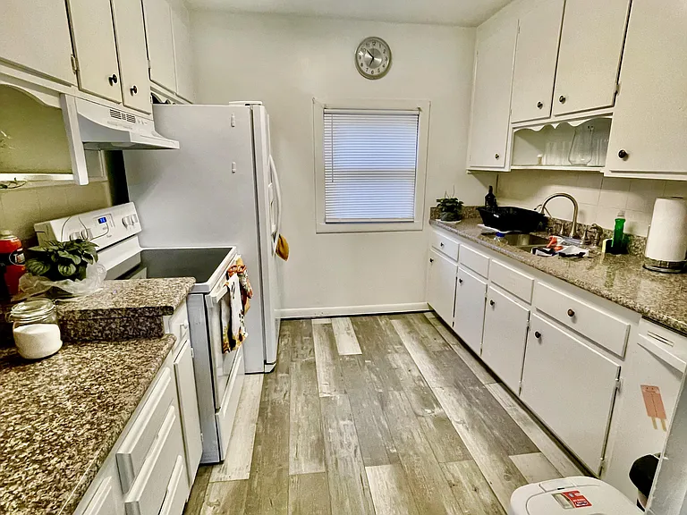 2 refrigerators, microwave, stove, oven, dishwasher, coffee maker and toaster