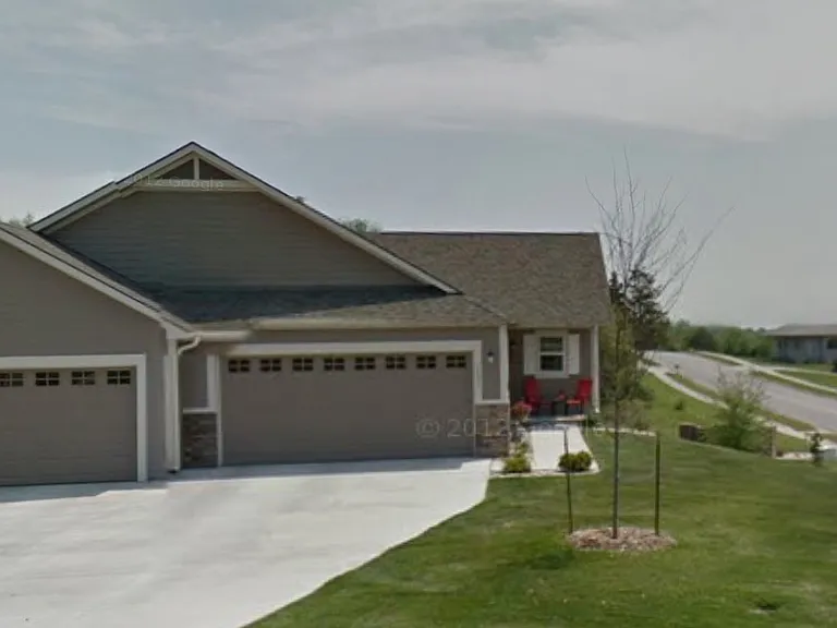 Front of house - Home is pictured on left side