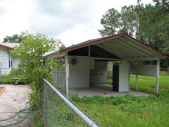 Detached carport-workshop