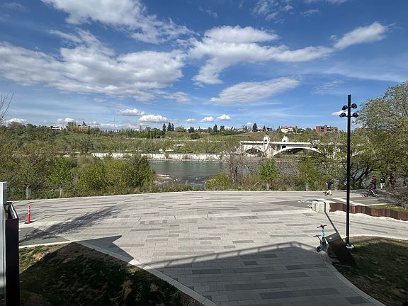 View from condo and patio: Bow River, trail system, and park.
