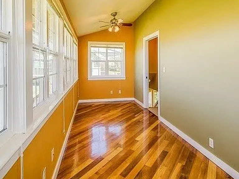 Upper lanai is enclosed with windows on 3-sides of the room. A bonus room that can be used as an office, game room, guest room or extra storage room.