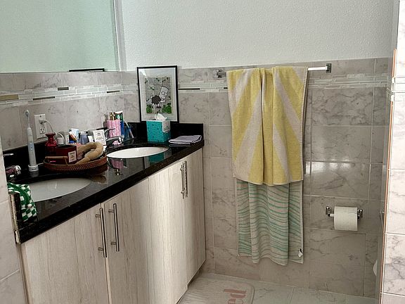 second floor full bathroom with tub