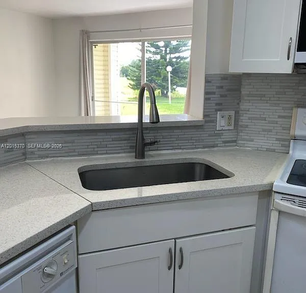 3441 NW 44th St #104 — Photo 7