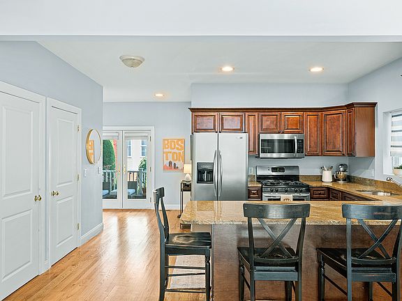 Kitchen area + coat closet and full-size pantry