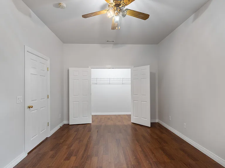 Bottom-level bedroom #5 or media room/2nd home office.