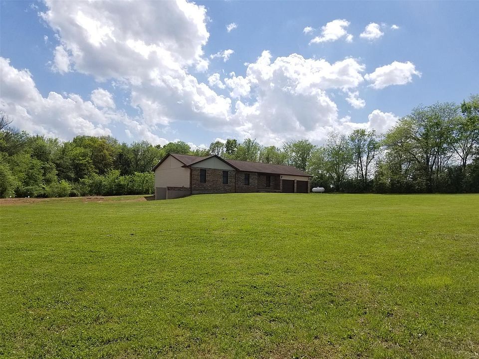 Ranch home on 3 acres, private lane that is well maintained by the owners on Rose Lane. Assessment is $100.00 year (2-payment op