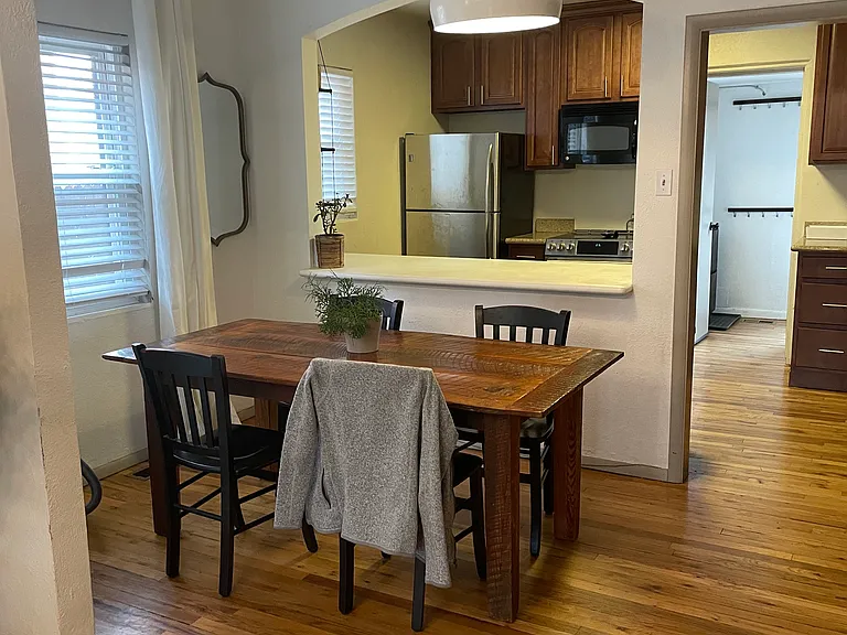view of dining room into kitchen (kitchen has been updated since photo)