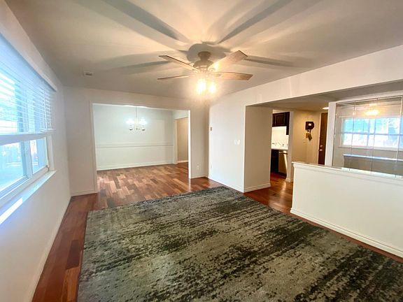 Spacious 2 Bedroom 1.5 Bath - Rochester, MI- Living Room- Dining Room/ Office Space- Kitchen- Hall to Master Bedroom and 2nd Bedroom Features: Open Concept, A/C, Entrance Coat Closet
