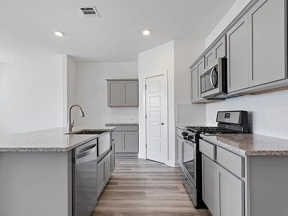 5th image of 12856 Silverbell Ave