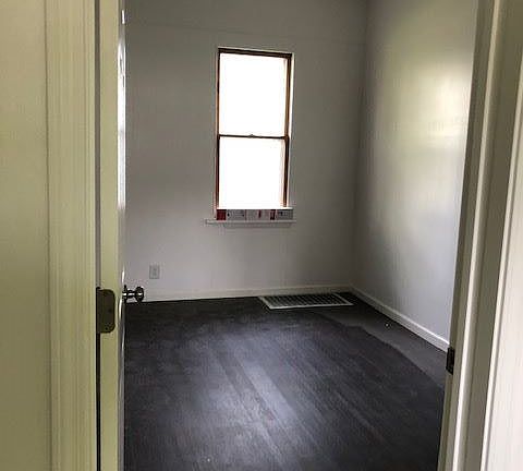 Two bedrooms on first floor and two upstairs bedrooms.