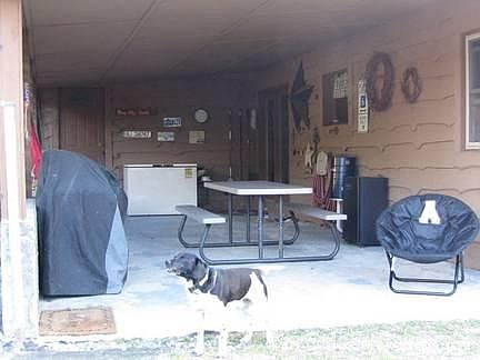 Storage room entrance on back wall
						:
						Great dog not included