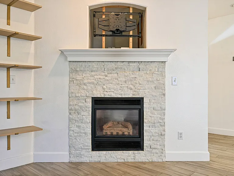 Stone fireplace, TV mount