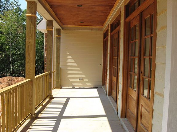 Enjoy the view from the covered front porch.