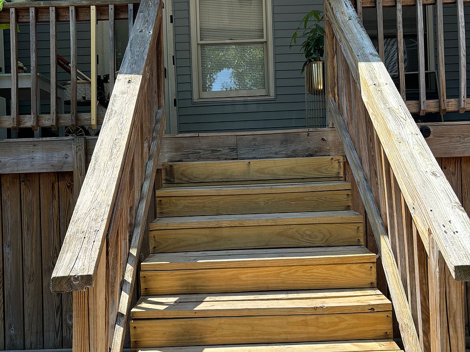 Stairs to back deck and back second entrance to apartment