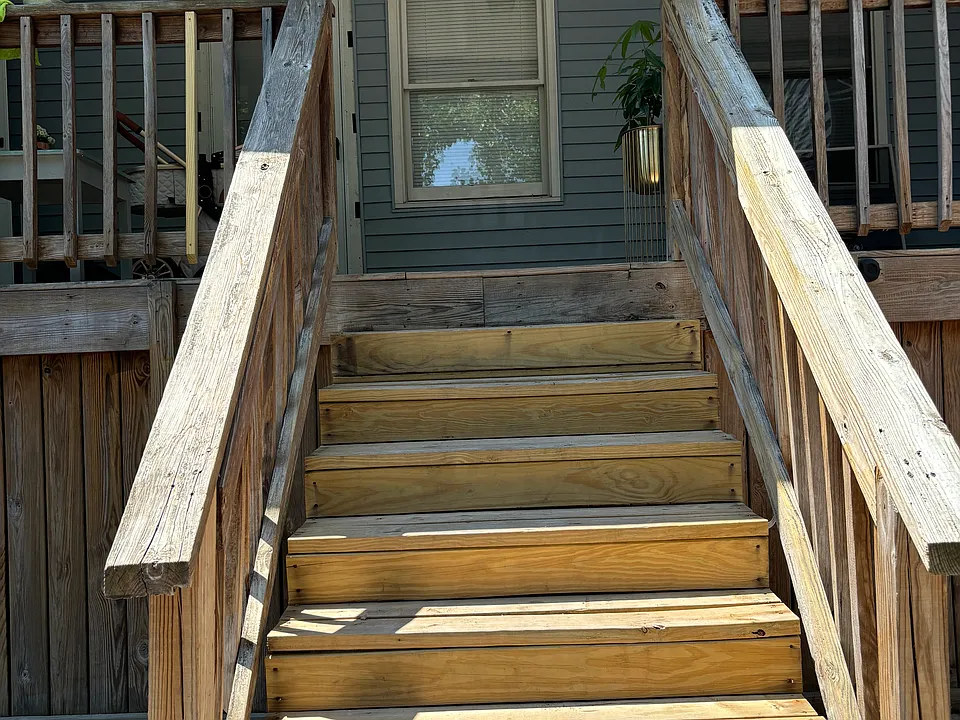 Stairs to back deck and back second entrance to apartment
