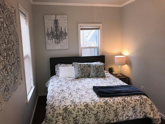 Bedroom one with queen size bed