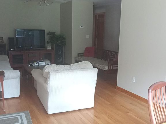 Lvrm area from Dining table. TV. 2nd bathrm on right.