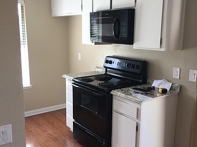Kitchen included Electric Stove, Microwave, Dishwasher. Refrigerator not included.