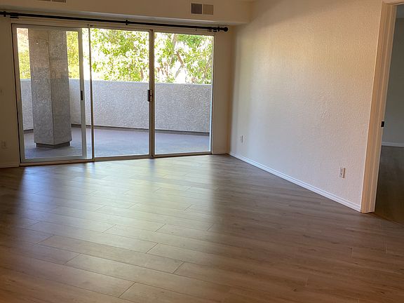 Large living room opens to large balcony