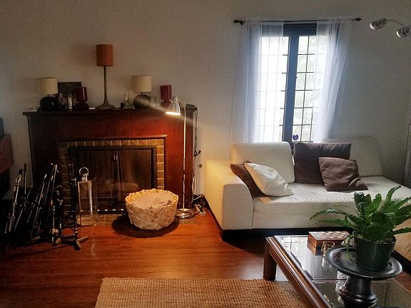 Living room fireplace & hard wood floor