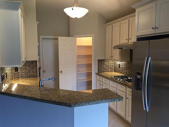 Family-sized walk-in pantry.