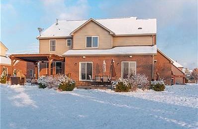 Entry into the home showcases the beautiful hardwood floors and lovely details which continue throughout the home.
