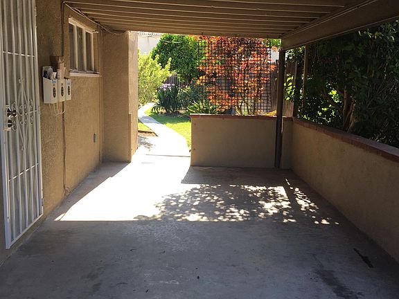 Car port with long driveway