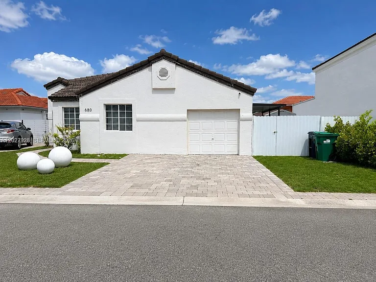 680 NW 124th Pl — Photo 1
