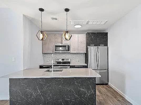 2nd image of 2733 E 12th St Penthouse 2
