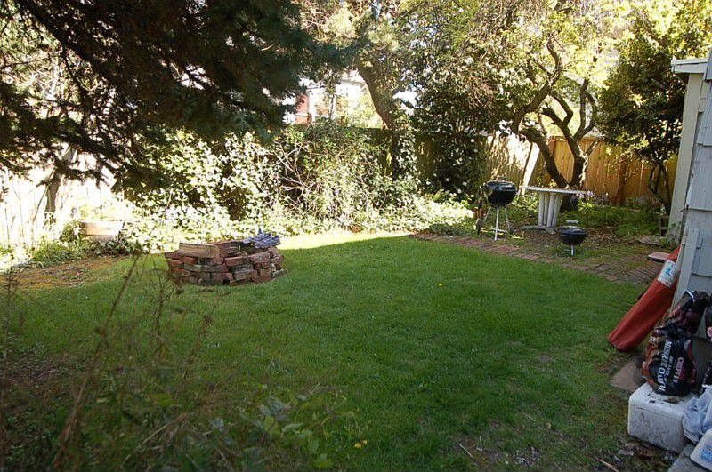 Fenced rear yard belongs to unit #1.